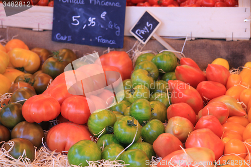 Image of Tomatoes at a market stall