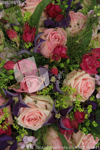 Image of Wedding arrangement in pink and purple