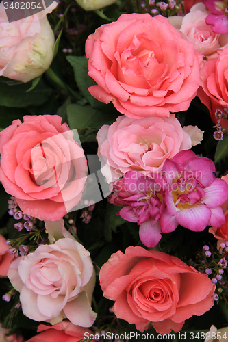 Image of Pink rose and freesia bridal flowers