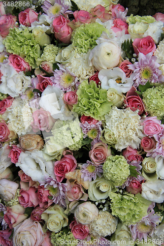 Image of Pink, green and white bridal arrangement