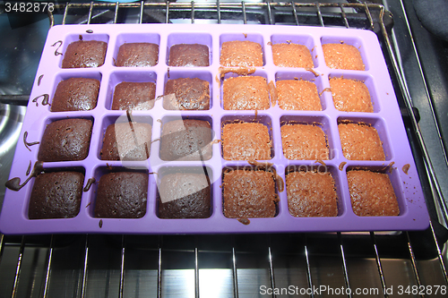 Image of Cooked cakes in a tray