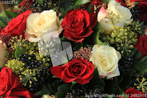 Image of Red and white rose bridal bouquet