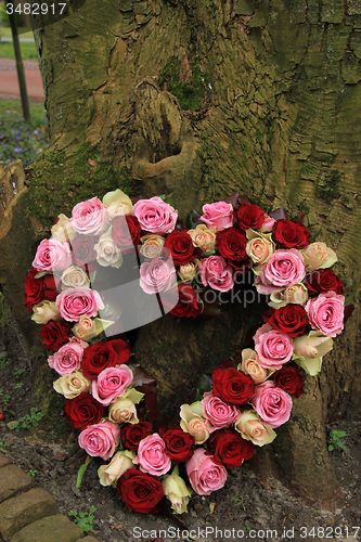 Image of Heart shaped sympathy flowers