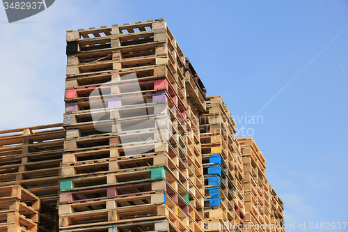 Image of Stacked wooden pallets