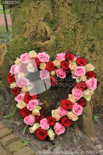 Image of Heart shaped sympathy flowers