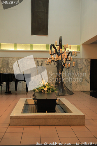 Image of Coffin with funeral flowers