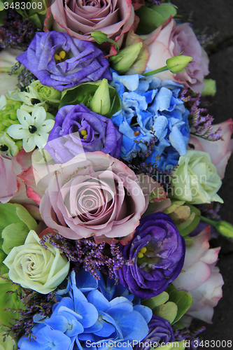 Image of Blue and purple bridal bouquet