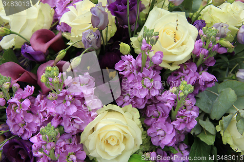 Image of Purple and white bridal arrangement