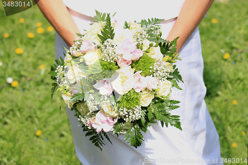 Image of Bride holding bouquet