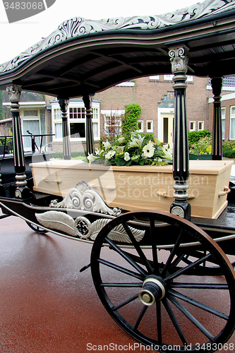 Image of Casket on a funeral carriage