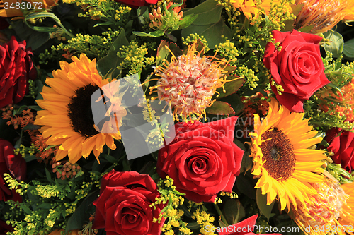 Image of Sunflowers and roses