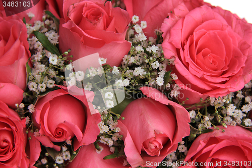 Image of Pink roses in a bridal arrangement