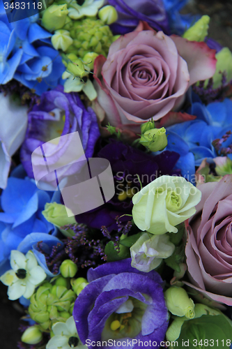 Image of Blue and purple bridal bouquet