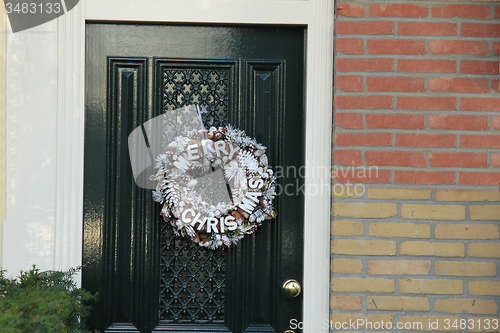 Image of Merry Christmas decoration on front door