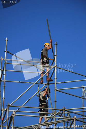 Image of Construction worker on scaffolding