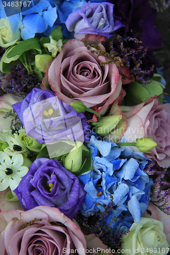 Image of Blue and purple bridal bouquet