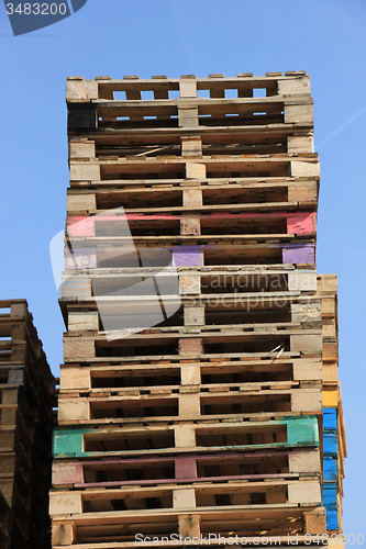 Image of Stacked wooden pallets