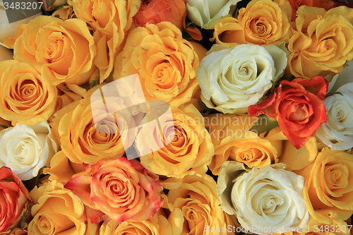 Image of yellow and white rose wedding arrangement