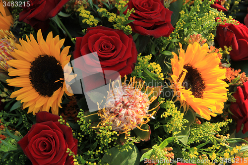 Image of Sunflowers and roses