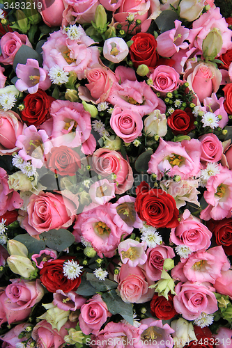 Image of Red, pink and white wedding arrangement