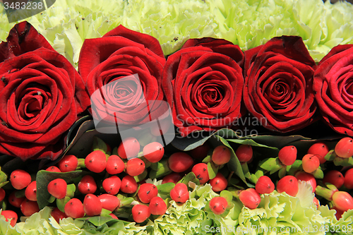Image of Red rose wedding arrangement