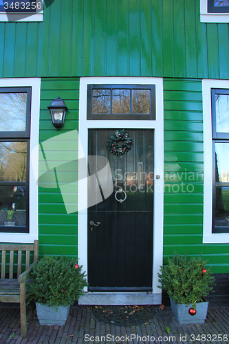 Image of Front door with Christmas decorations