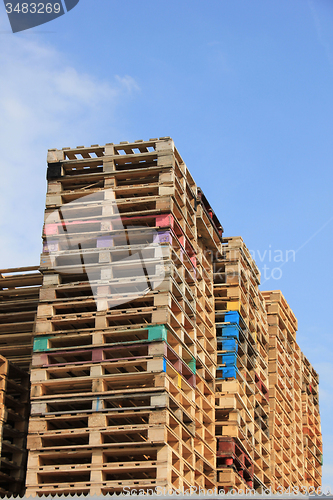 Image of Stacked wooden pallets