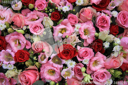 Image of Red, pink and white wedding arrangement