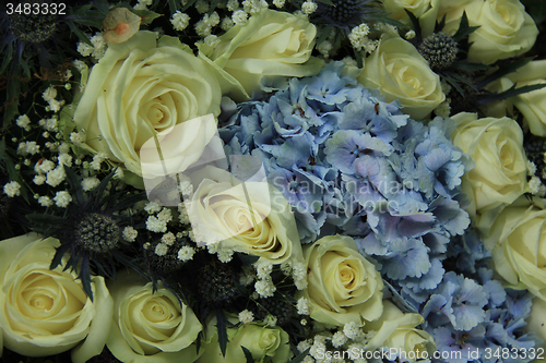 Image of Blue and white wedding arrangement