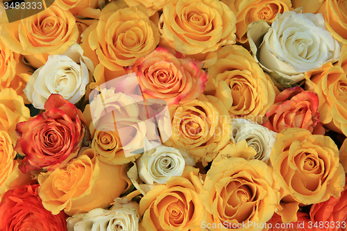 Image of yellow and white rose wedding arrangement
