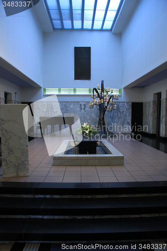 Image of Coffin with funeral flowers