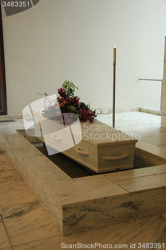 Image of Funeral flowers on a casket