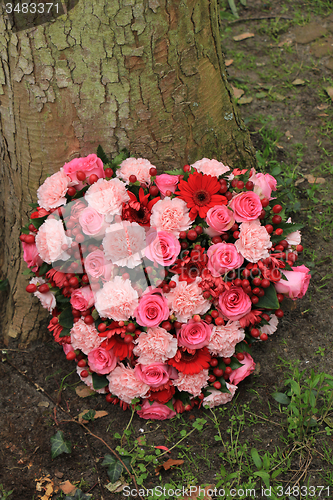 Image of Heart shaped sympathy flowers