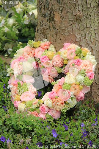 Image of Heart shaped sympathy flowers