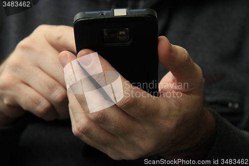 Image of Man with smartphone
