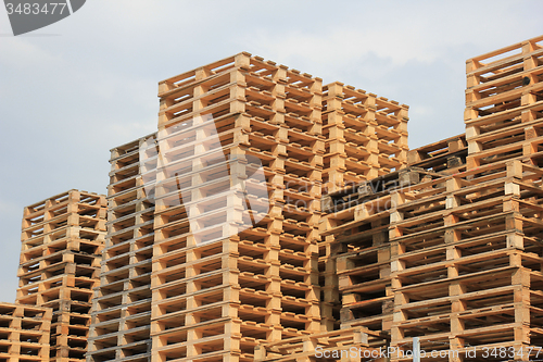 Image of Stacked wooden pallets