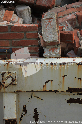 Image of Bricks in a dumpster