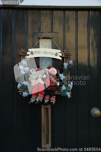 Image of Merry Christmas decoration on front door