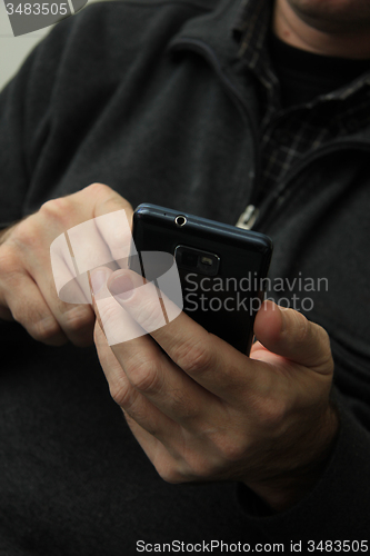 Image of Man with smartphone