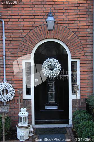 Image of Front door with Christmas decorations