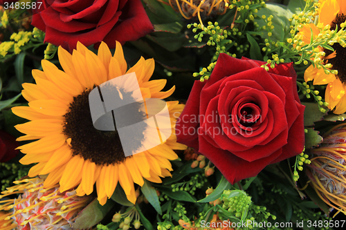 Image of Sunflowers and roses