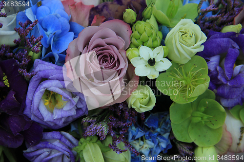 Image of Blue and purple bridal bouquet