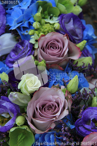 Image of Blue and purple bridal bouquet