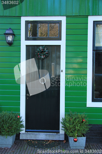 Image of Front door with Christmas decorations