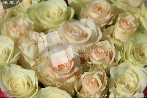 Image of Roses in different shades of pink, bridal arrangement