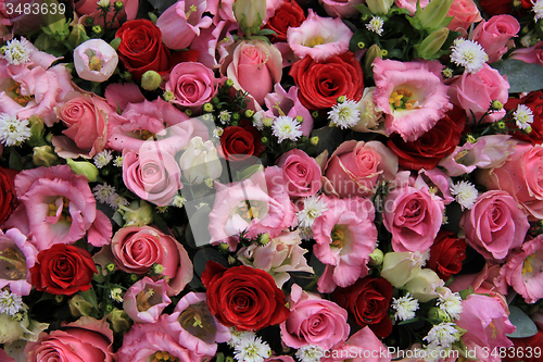 Image of Red, pink and white wedding arrangement