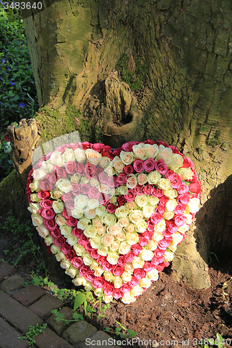 Image of Heart shaped sympathy flowers