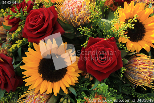 Image of Sunflowers and roses