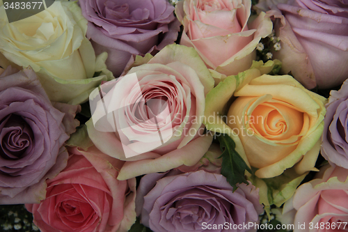 Image of Pastel roses in bridal arrangement