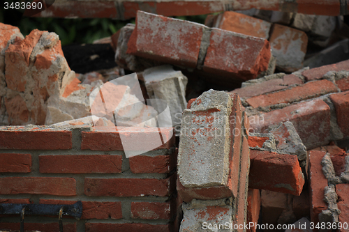 Image of Bricks in a dumpster